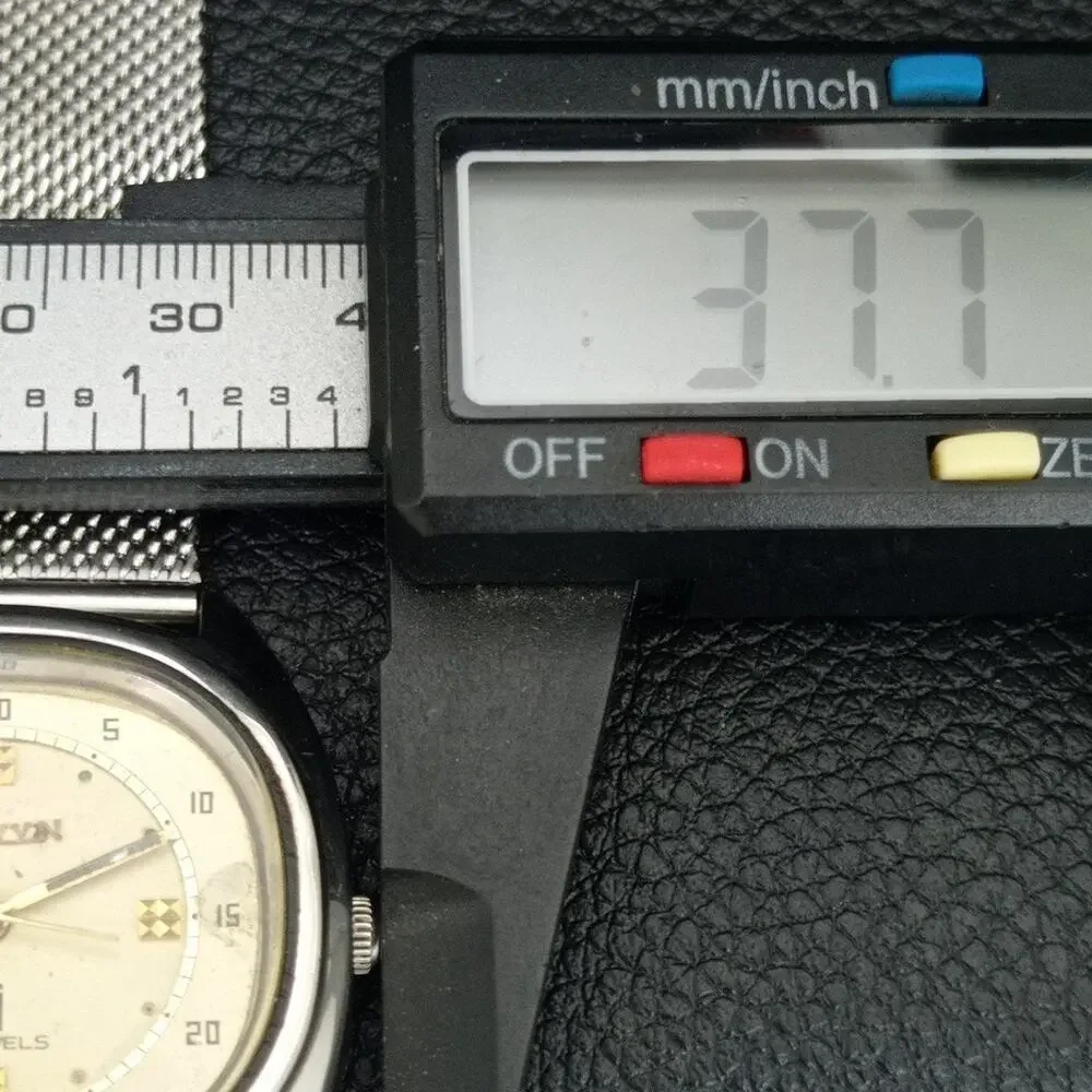 Vintage 1976 Allwyn Manual Mens Silver Watch W/Steel Strap & Gold accents